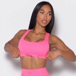 NWT Bombshell Sportswear Square Neck
Pink Sports Bra

Color—Cotton Candy Skies